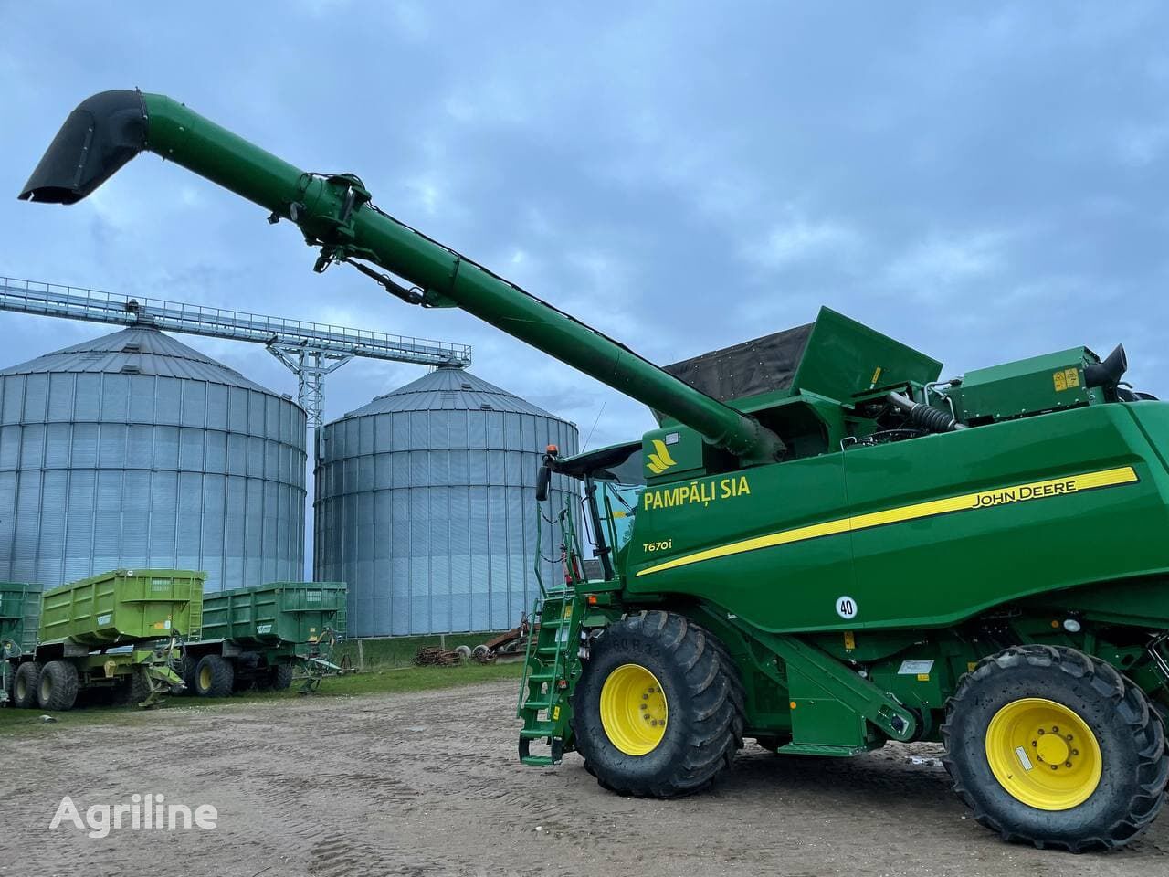 Moissonneuse-batteuse JOHN DEERE T670i - Photo 36