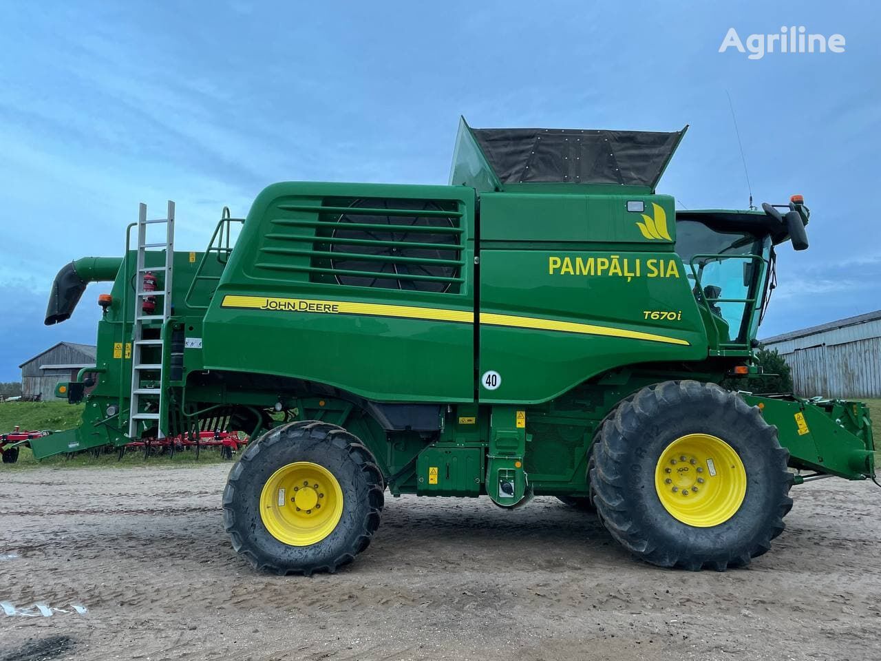 Moissonneuse-batteuse JOHN DEERE T670i - Photo 47