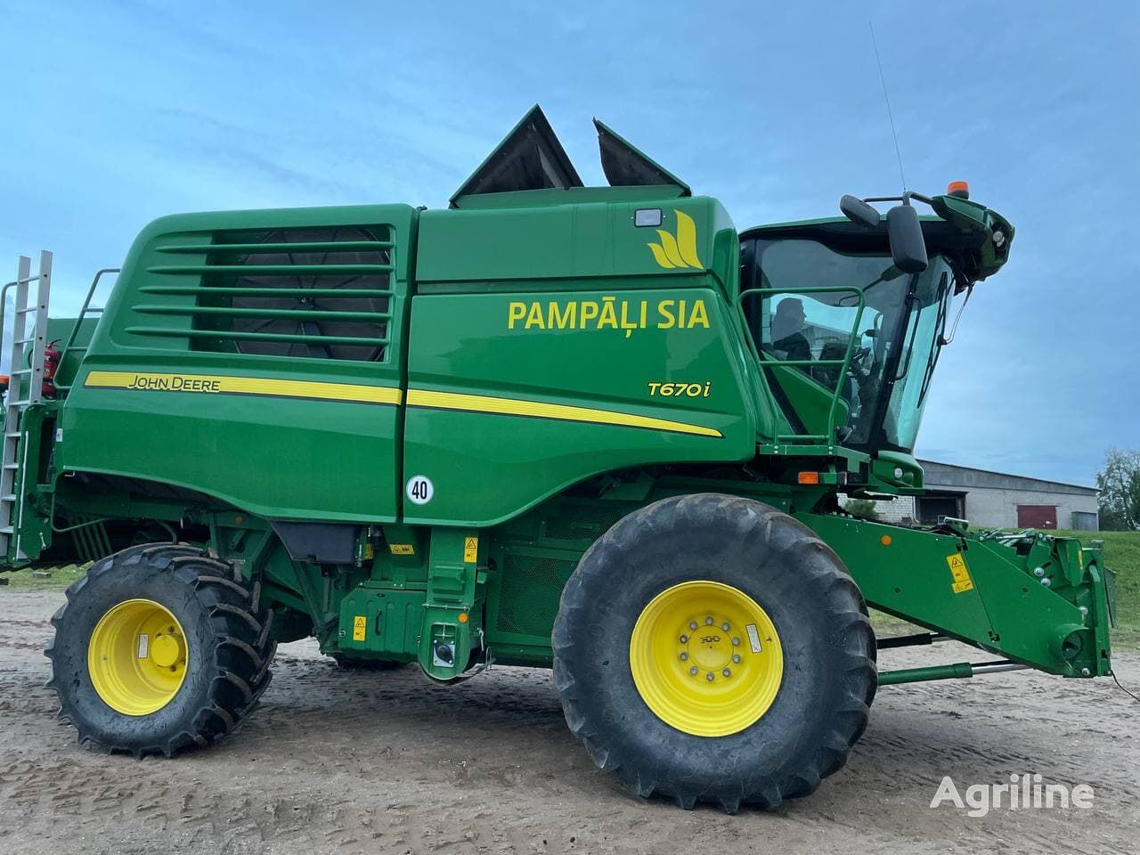 Moissonneuse-batteuse JOHN DEERE T670i - Photo 48