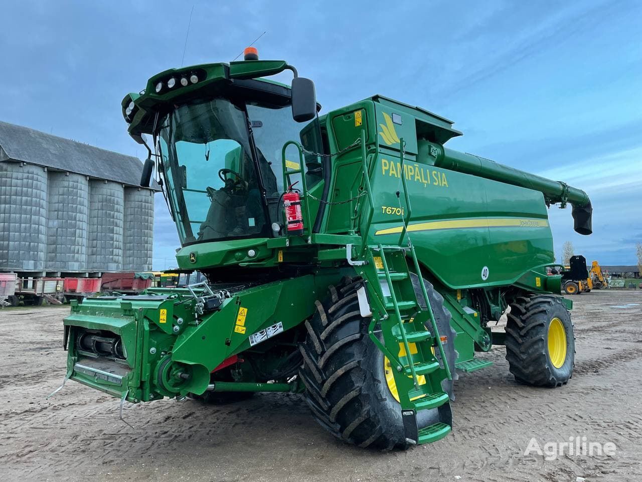 Moissonneuse-batteuse JOHN DEERE T670i - Photo 53