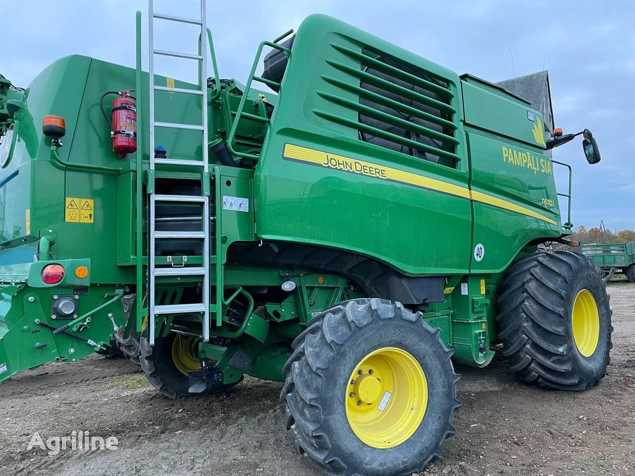 Moissonneuse-batteuse JOHN DEERE T670i - Photo 56