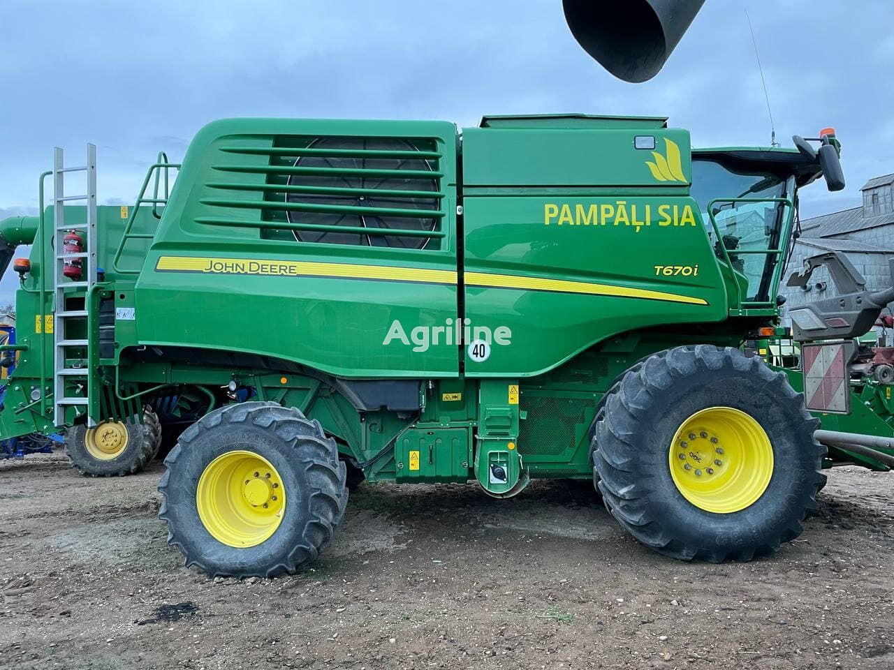 Moissonneuse-batteuse JOHN DEERE T670i - Photo 59