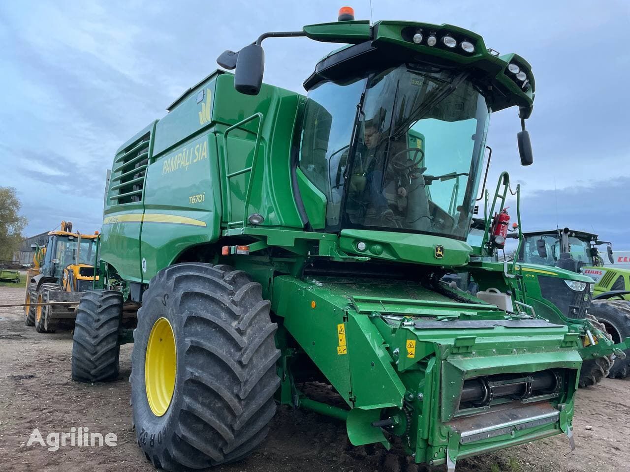 Moissonneuse-batteuse JOHN DEERE T670i - Photo 61